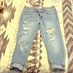 Distressed blue jeans